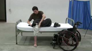 Quadriplegics bed mobility and dressing [upl. by Mcneely]