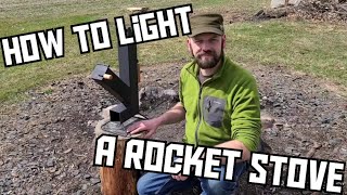 How To Light A Rocket Stove [upl. by Assenahs]